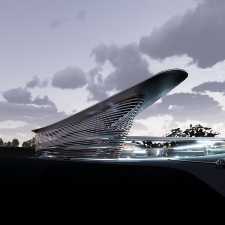 Sculptural curved architecture of a motorsport performance resort at dusk - Oxfordshire, United Kingdom